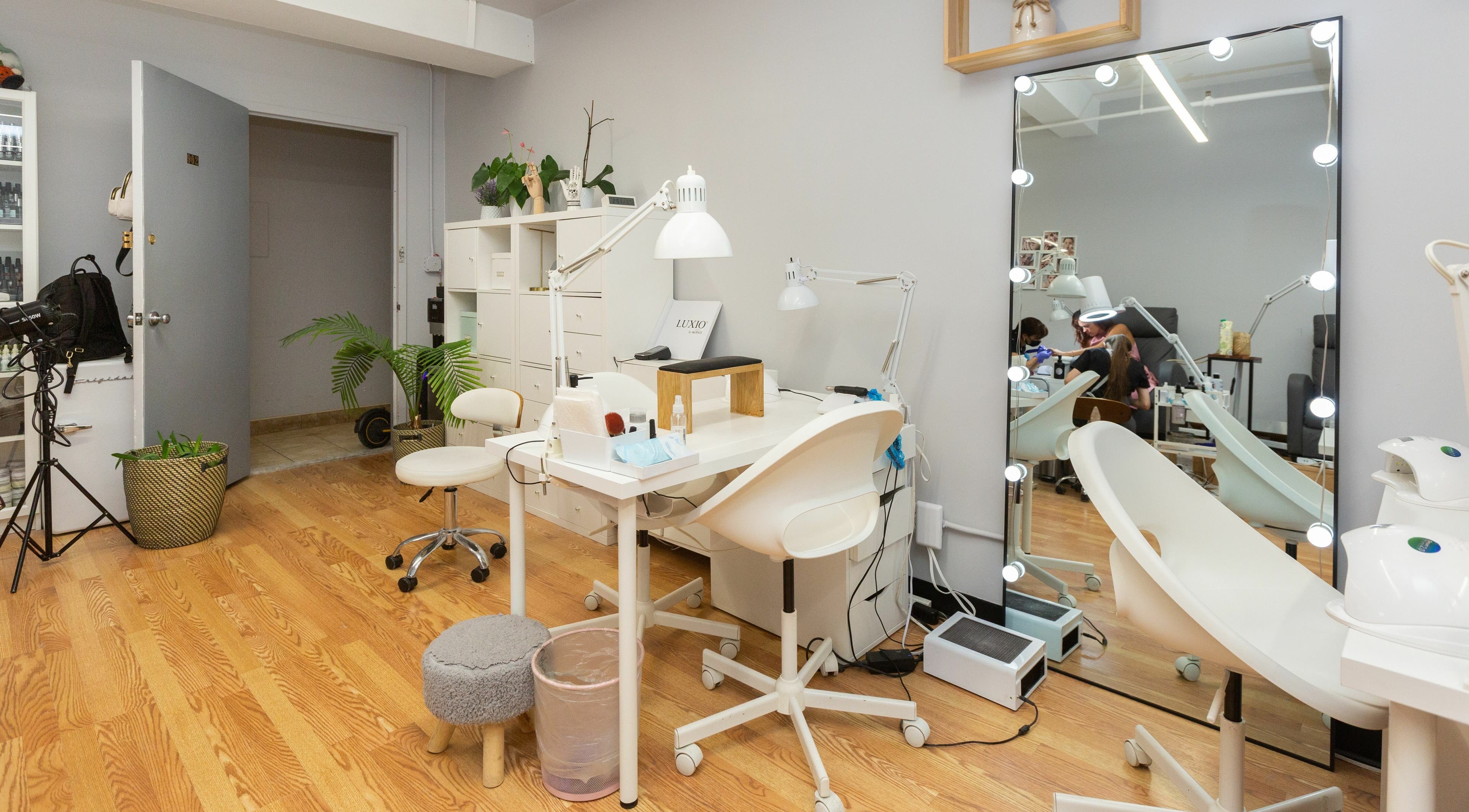 Modern nail salon setup at Zaranailsnyc, New York, United States, US with stylish decor and professional equipment.