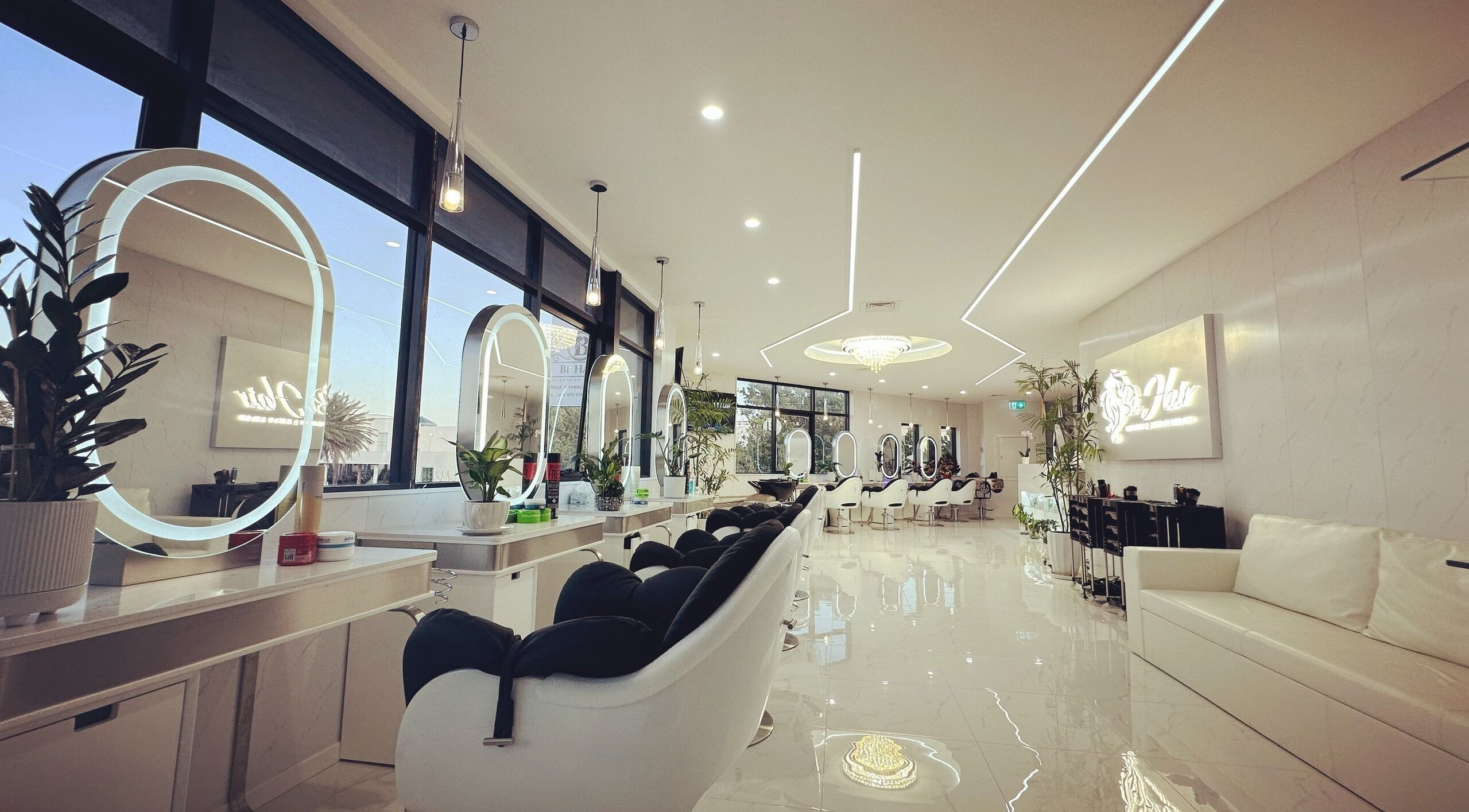 Luxurious interior of Bi Hair Beauty Salon, Morley, Western Australia, AU, featuring modern decor and chic styling stations.