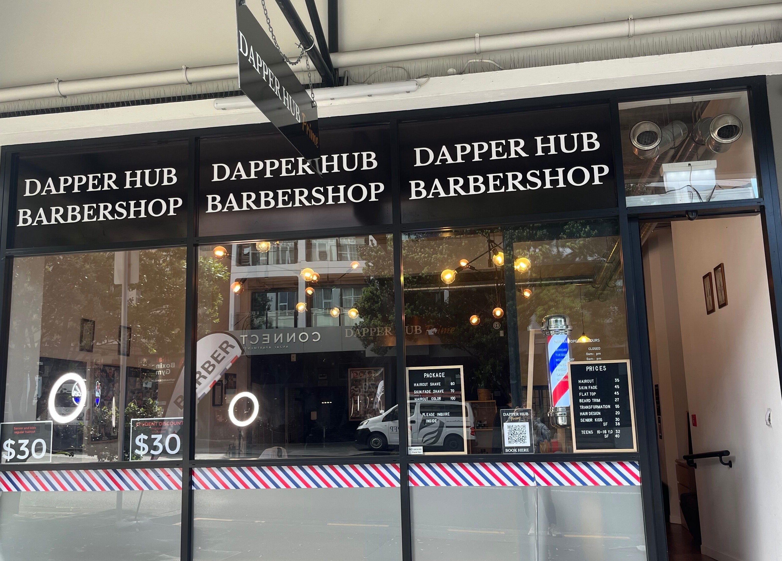 Front view of Dapper Hub Barbershop CBD in Auckland, Auckland, NZ, showcasing its welcoming entrance.