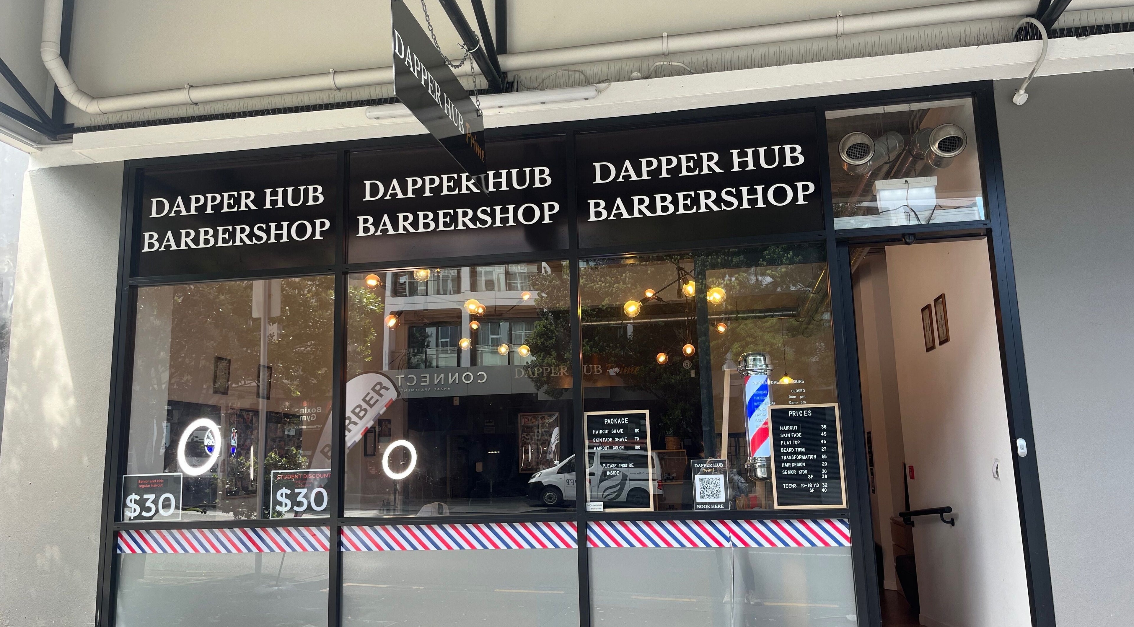 Front view of Dapper Hub Barbershop CBD in Auckland, Auckland, NZ, showcasing its welcoming entrance.