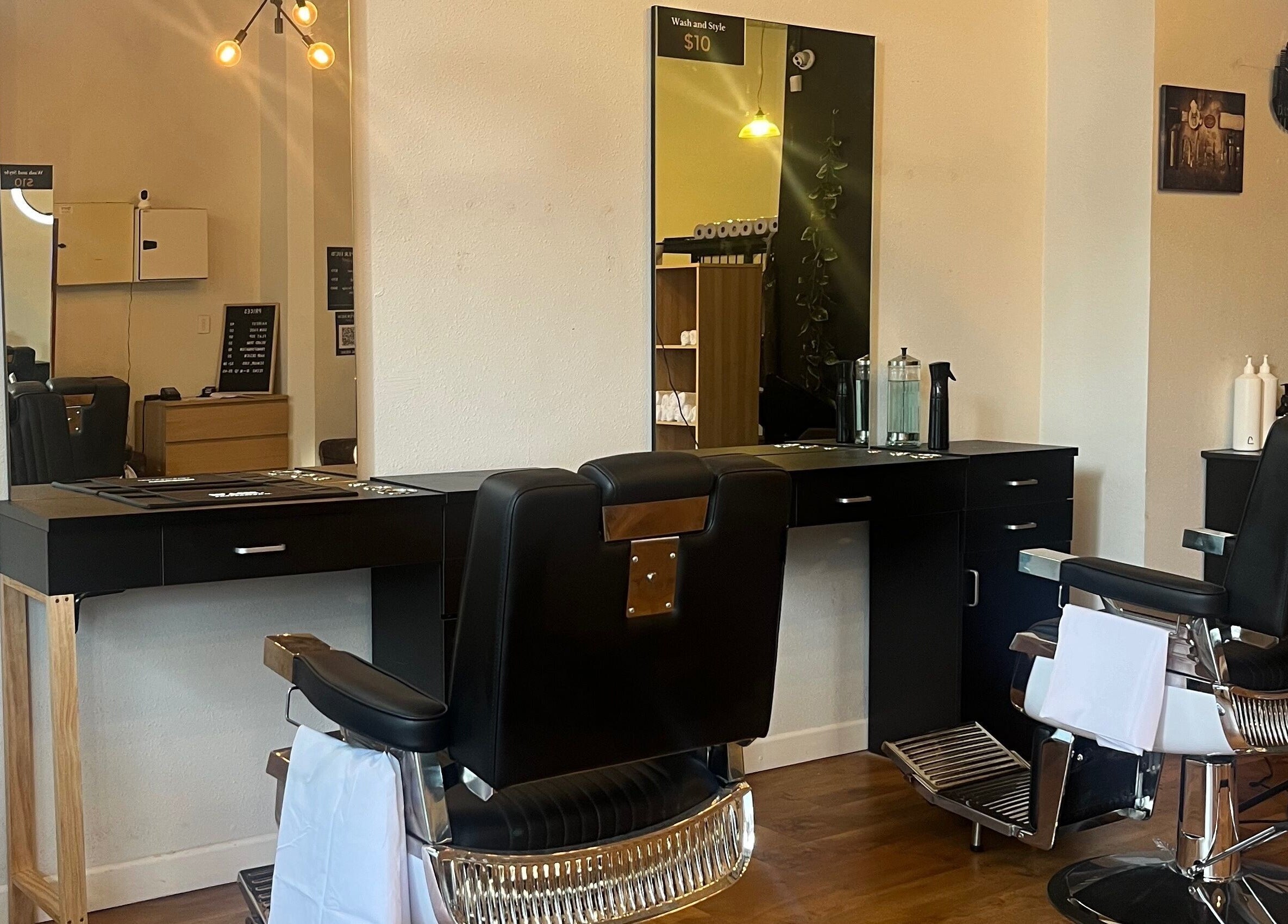 Modern barber chairs at Dapper Hub Barbershop CBD, Auckland, Auckland, NZ, showcasing stylish interior design.