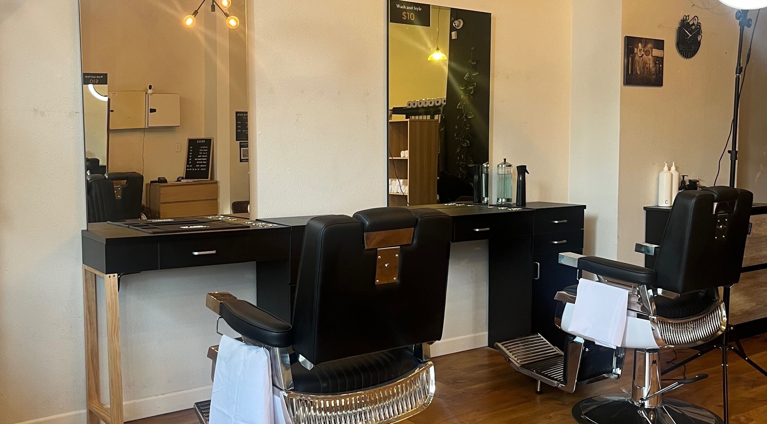 Modern barber chairs at Dapper Hub Barbershop CBD, Auckland, Auckland, NZ, showcasing stylish interior design.