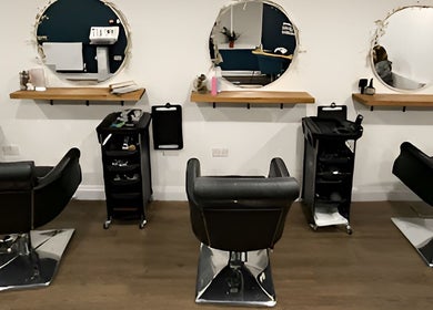 Stylish salon stations at Evolve Salon, Clacton-on-Sea, England, GB showcase modern beauty.