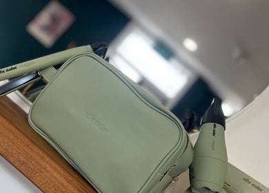 Mint green styling tools at Evolve Salon, Clacton-on-sea, England, GB, showcasing professional beauty gear.