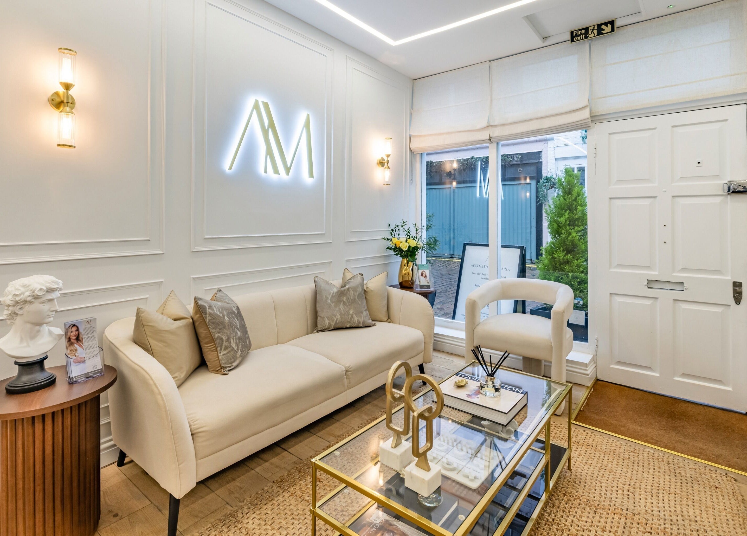 Chic interior of Aesthetic by Maria, London, England, GB featuring elegant seating and decor.
