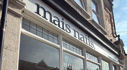 Front view of Mais Nails shop in Barry, Wales, GB showcasing elegant store signage.