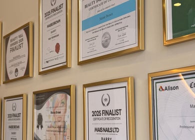 Framed certificates showcasing Mais Nails' accolades and professionalism in Barry, Wales, GB.