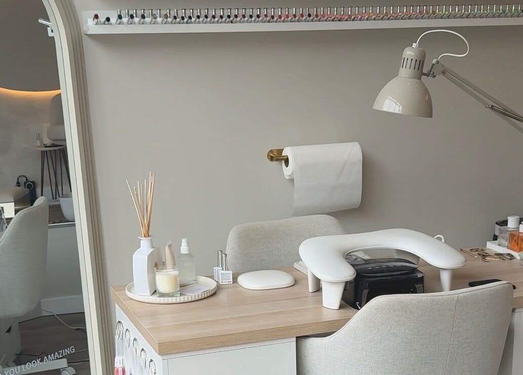 Mais Nails workspace in Barry, Wales, GB with chic decor and nail polish display.