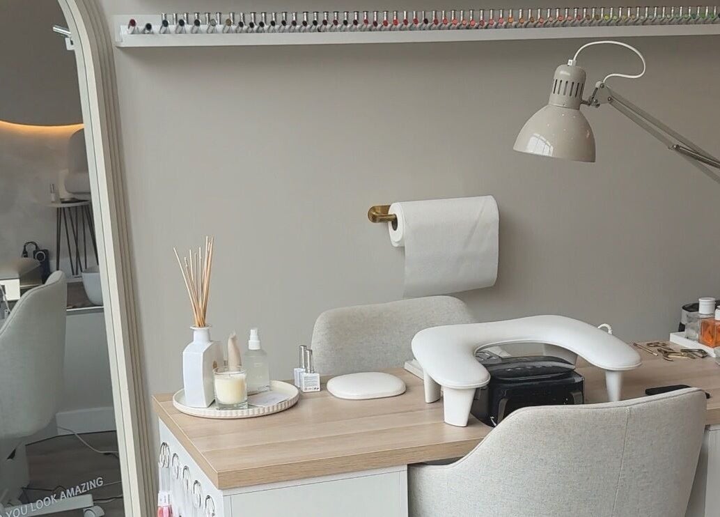 Mais Nails workspace in Barry, Wales, GB with chic decor and nail polish display.
