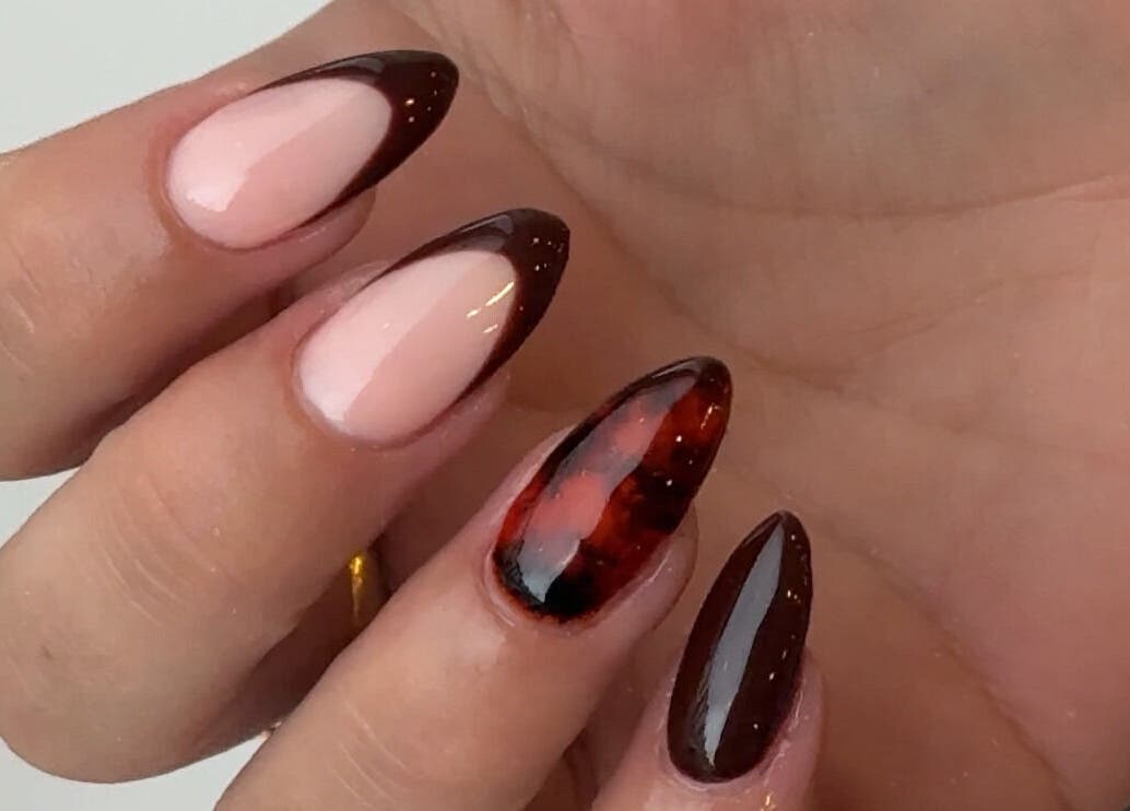 Stylish nail art featuring elegant designs at Mais Nails in Barry, Wales, GB.