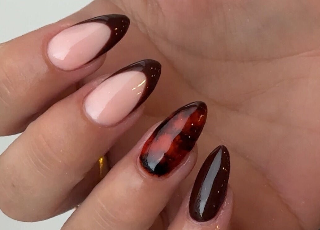 Stylish nail art featuring elegant designs at Mais Nails in Barry, Wales, GB.