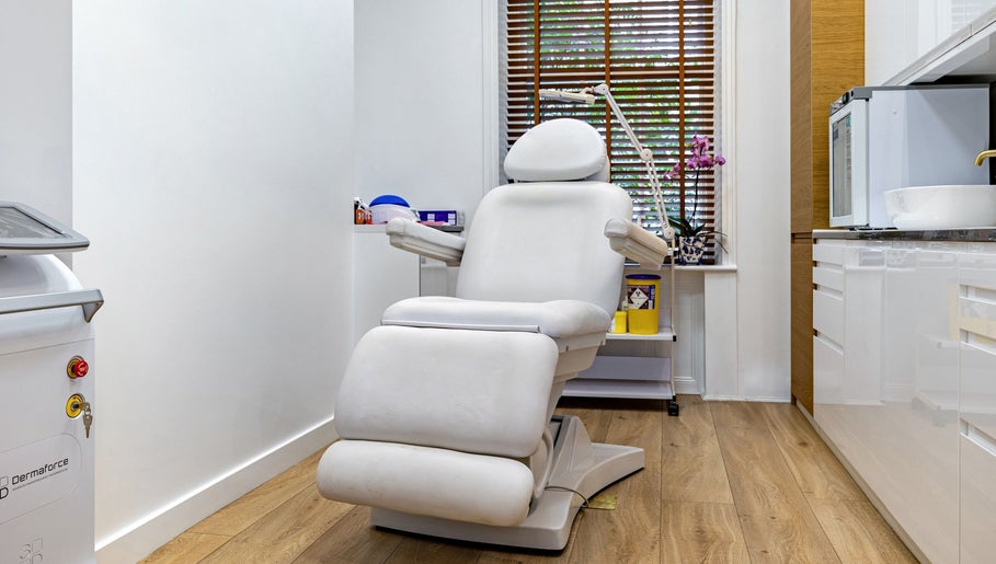 Relaxing treatment chair in Crystal Medica, London, England, GB, featuring modern wellness equipment.