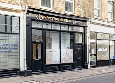 Street view of Crystal Medica in London, England, GB, showcasing its elegant storefront.