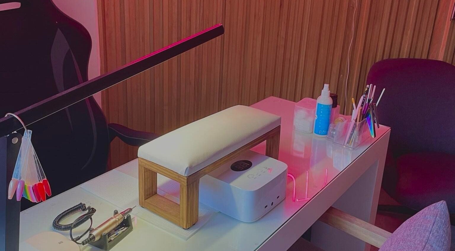 Nail station setup at KLL Beauty, Cape Town, Western Cape, ZA, featuring tools and products.