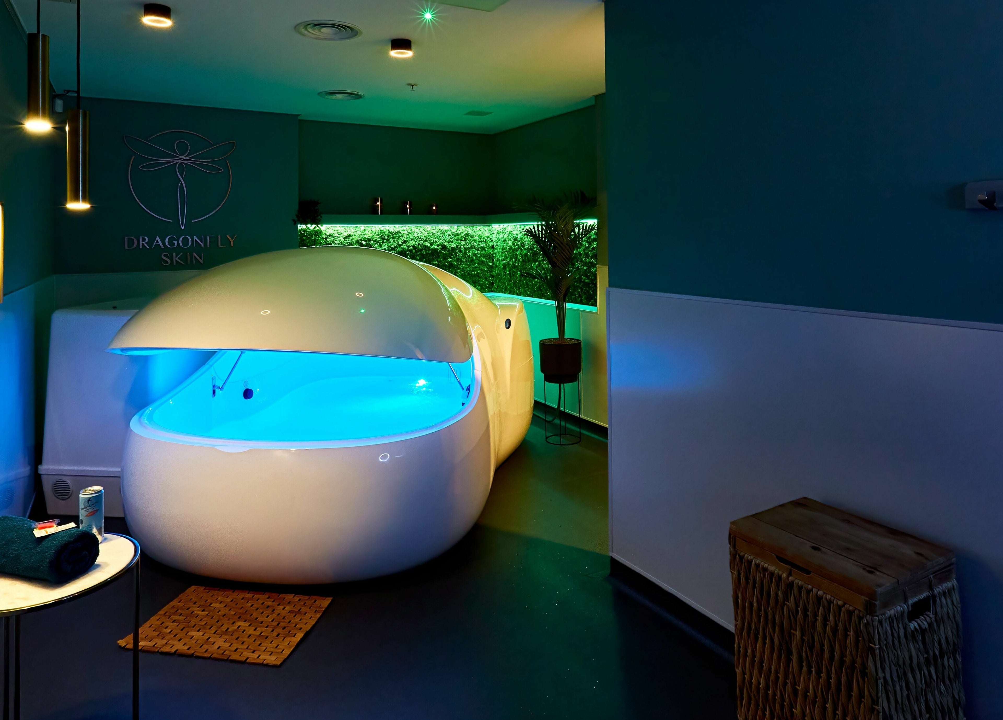 Relaxing float pod at Dragonfly Skin Day Spa, Leeds, England, GB with ambient lighting and serene decor.