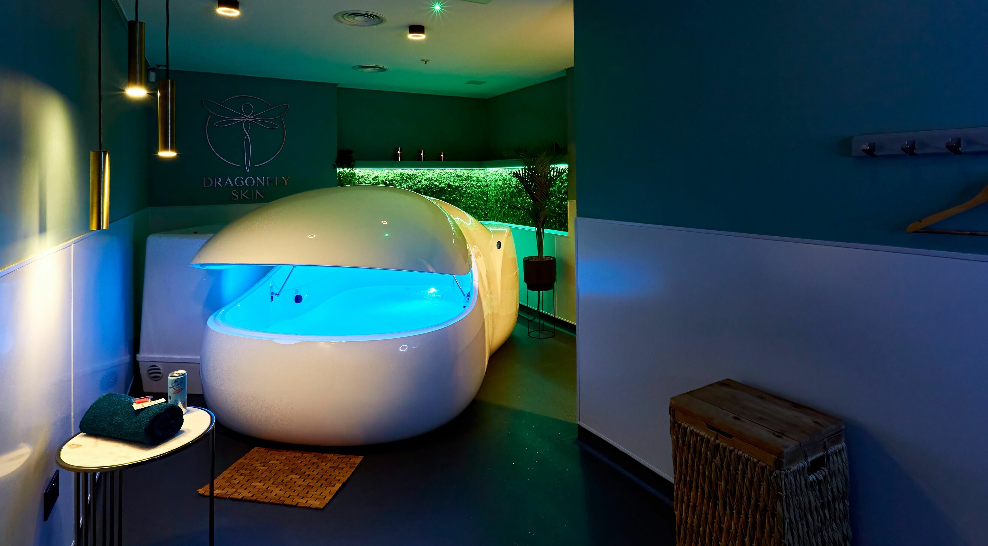 Relaxing float pod at Dragonfly Skin Day Spa, Leeds, England, GB with ambient lighting and serene decor.