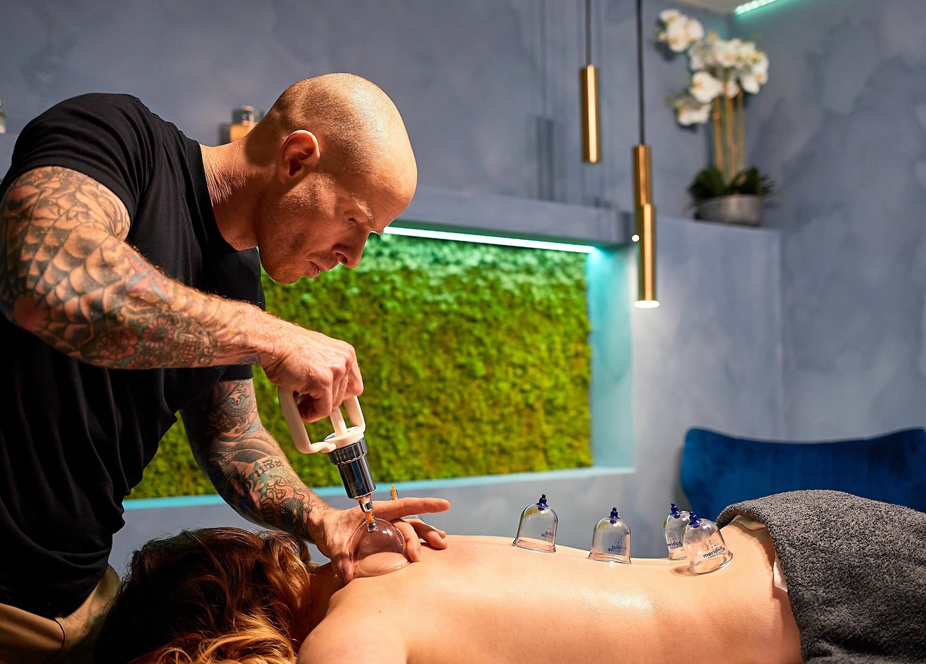 Cupping therapy session at Dragonfly Skin Day Spa, Leeds, England, GB with a relaxing ambiance.