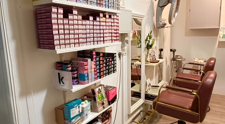Modern salon chairs and hair products at HairByIsk Studio, Singapore, Singapore, SG.