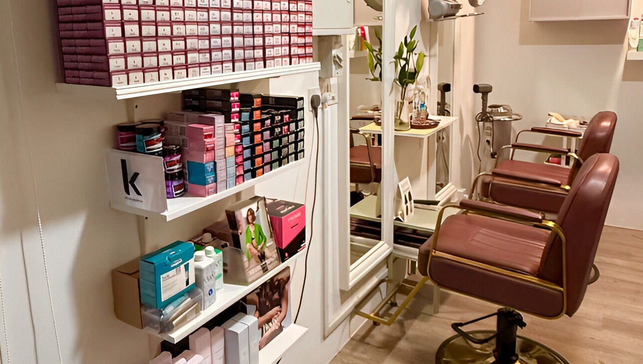 Comfortable salon chairs at HairByIsk Studio, Singapore, SG, showcasing elegant beauty space.