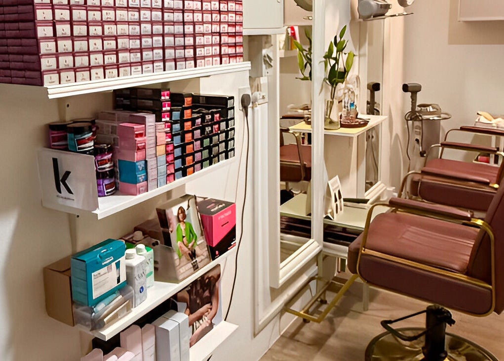 Comfortable salon chairs at HairByIsk Studio, Singapore, SG, showcasing elegant beauty space.