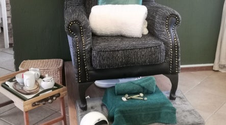 Relaxing armchair with spa accessories at Amazing Beauty Salon and Wellness, Pretoria, Gauteng, ZA.