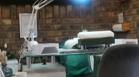 Relaxing treatment room at Amazing Beauty Salon and Wellness in Pretoria, Gauteng, ZA, with spa bed and decor.