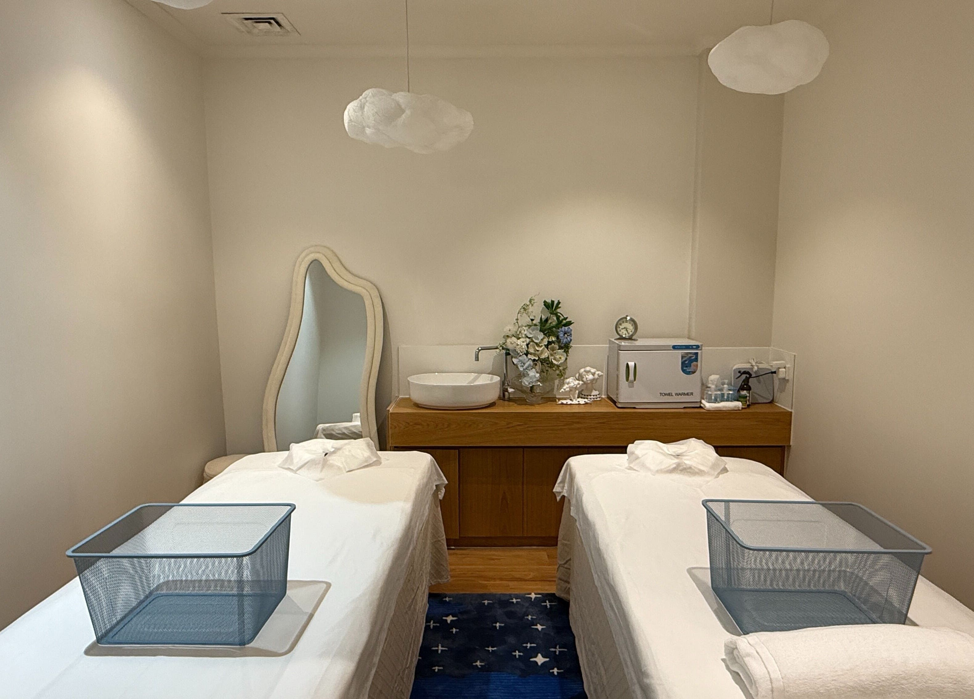 Calm massage room at Daydream Thai Massage & Spa South Melbourne, Melbourne, Victoria, AU with twin beds.