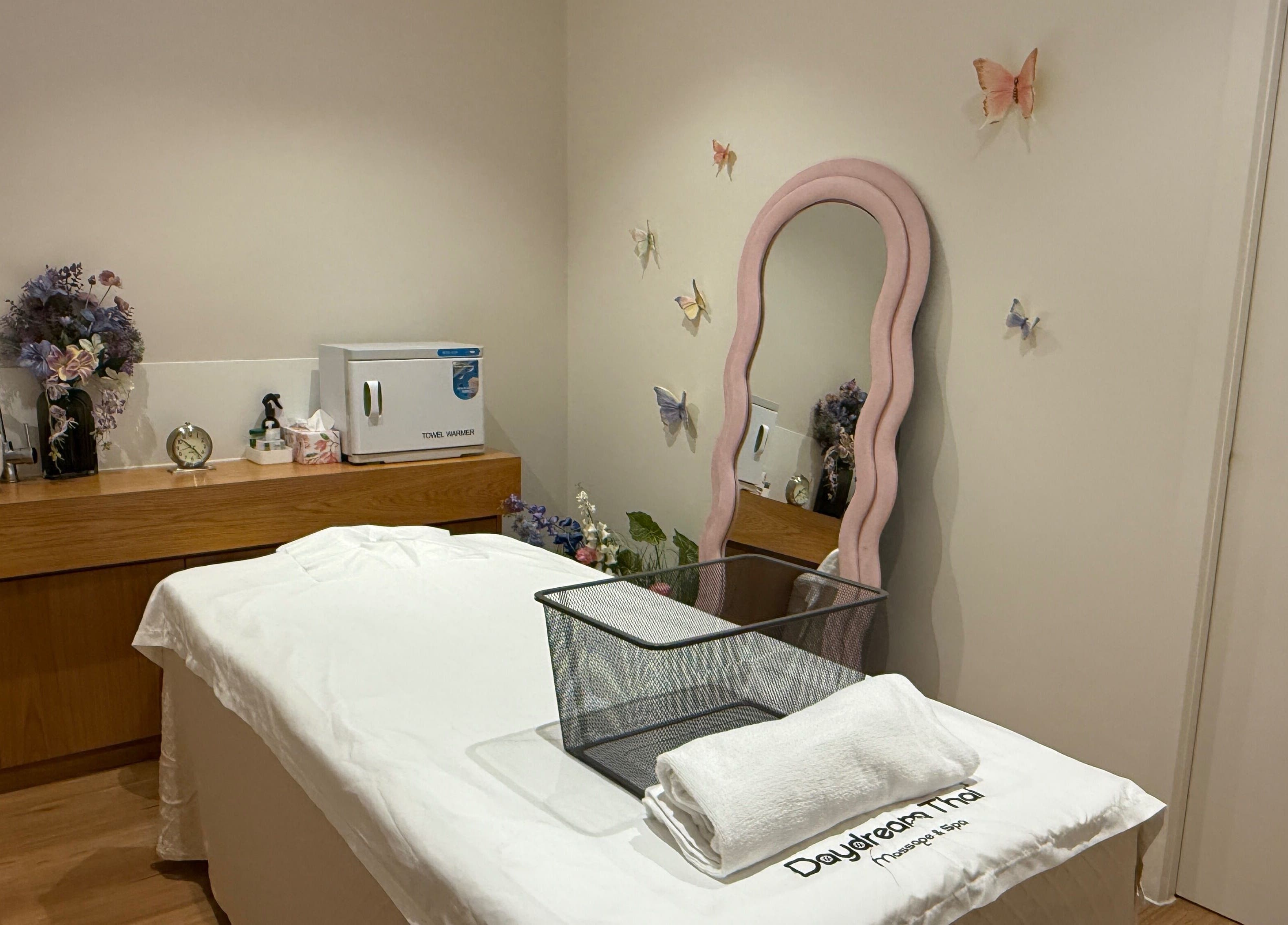 Relaxing massage room at Daydream Thai Massage & Spa South Melbourne, Melbourne, Victoria, AU with floral decor.