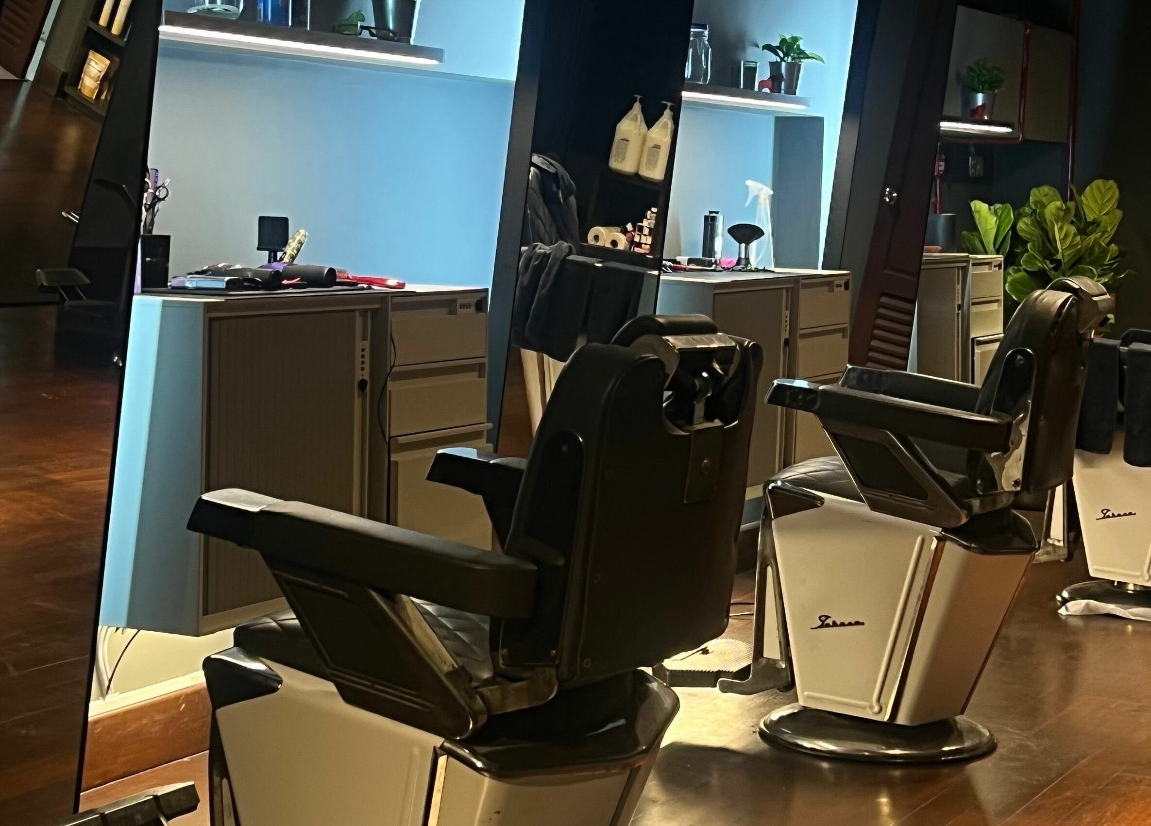 Elegant barber chairs at The Podium Salon & Barber .Co -Haji Lane- in Singapore, Singapore, SG.