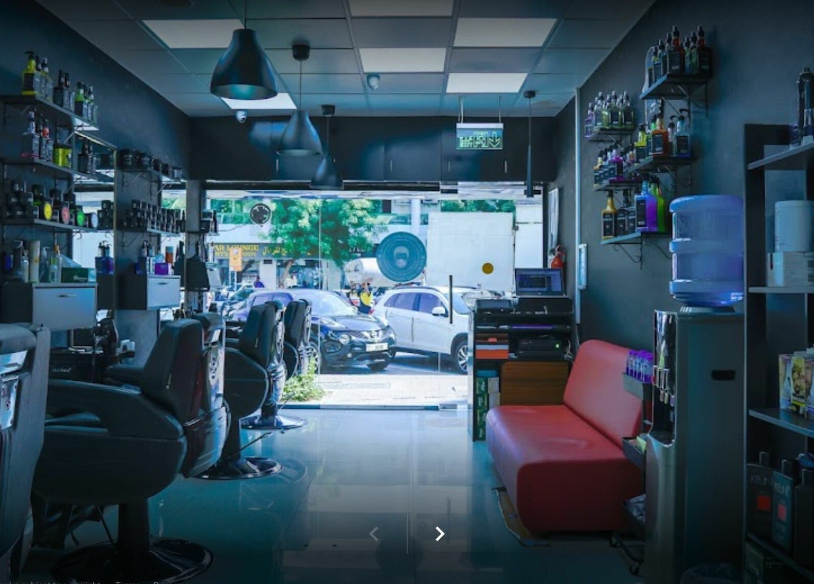Interior of Fadez Gents Salon in Dubai, AE, showcasing modern barber chairs and stylish décor.