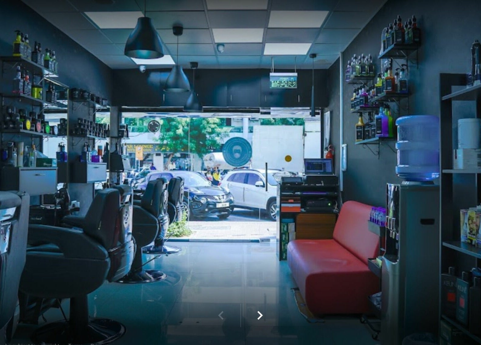 Interior of Fadez Gents Salon in Dubai, AE, showcasing modern barber chairs and stylish décor.