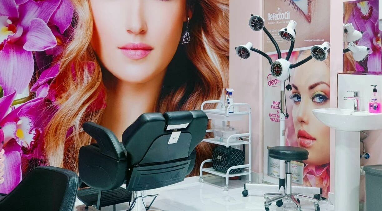 Stylish interior of Chance Beauty Lounge in Dubai with floral decor and modern salon chair.