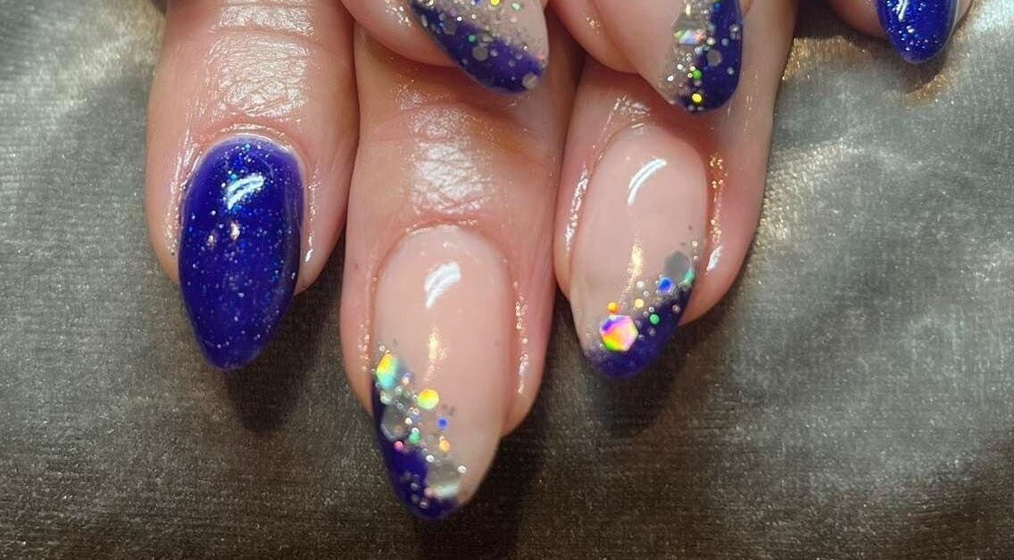 Stylish glitter nails at Pretty Beautiful, Waterlooville, England, GB - perfect for a standout look.