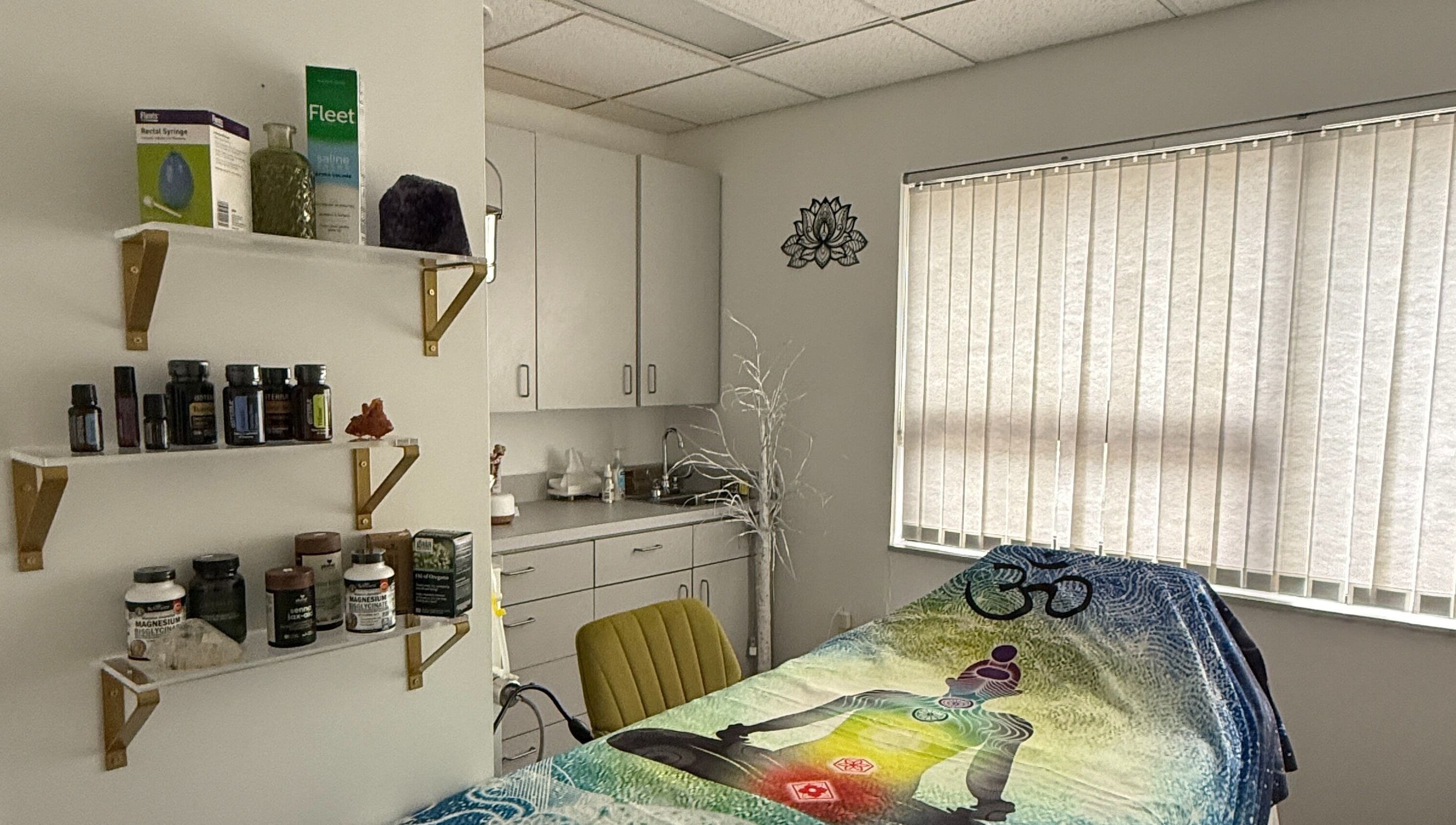 Calm treatment room at Legend Wellness Center - Yonkers, featuring wellness products and soft natural light.