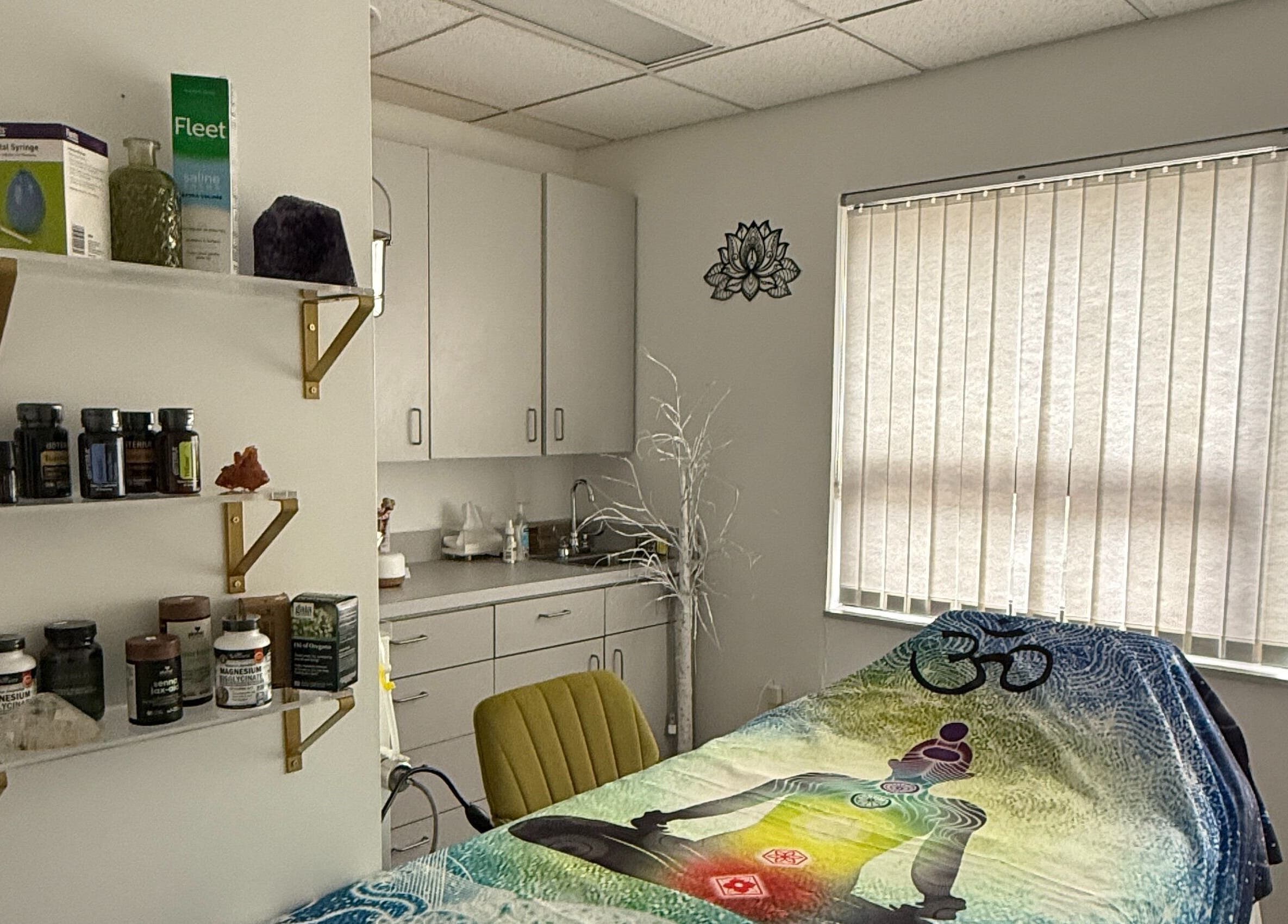 Calm treatment room at Legend Wellness Center - Yonkers, featuring wellness products and soft natural light.