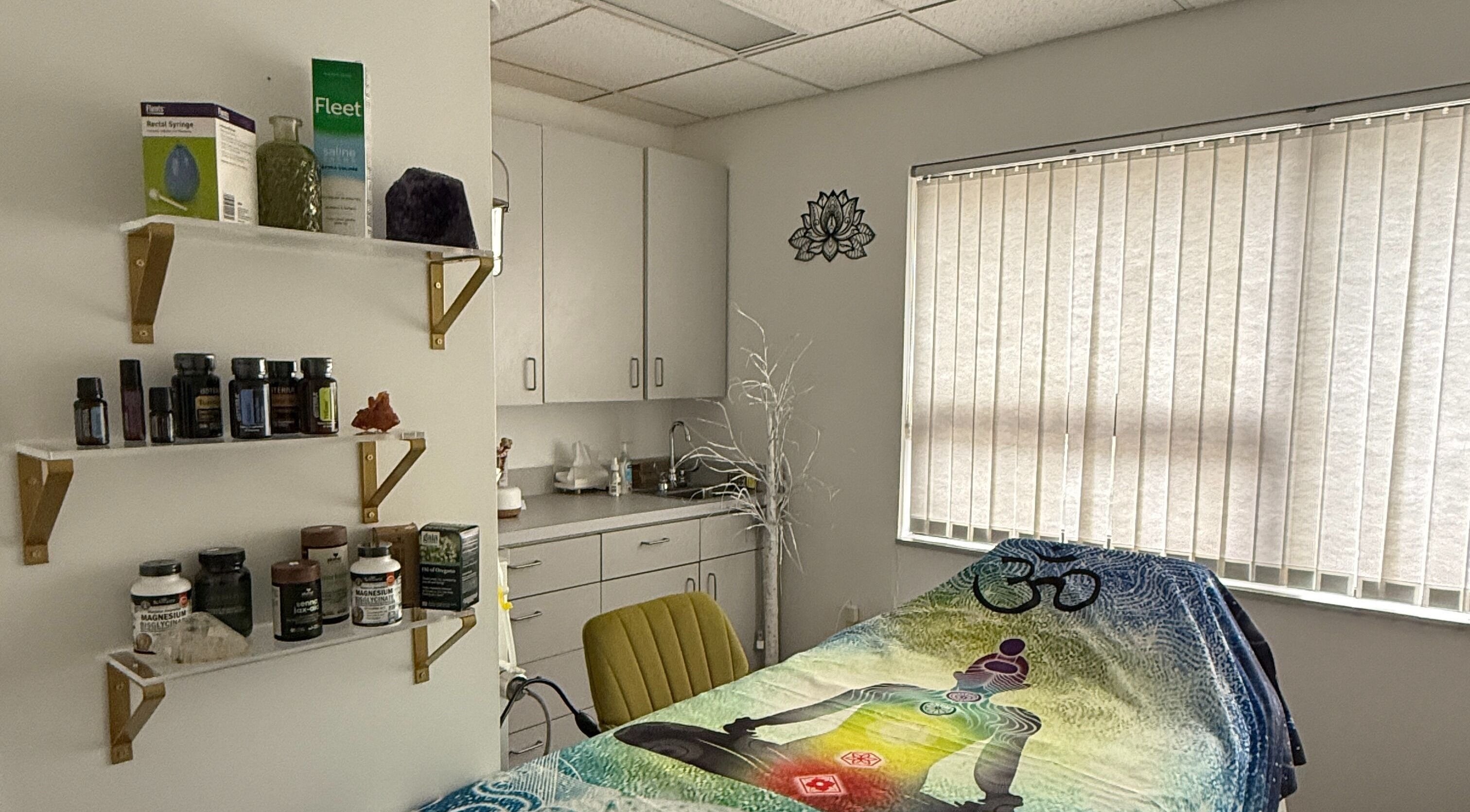 Calm treatment room at Legend Wellness Center - Yonkers, featuring wellness products and soft natural light.