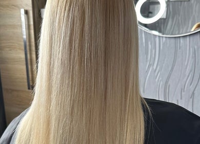 Blonde hair styled smoothly at Beauty By Marina in Thetford, England, GB.