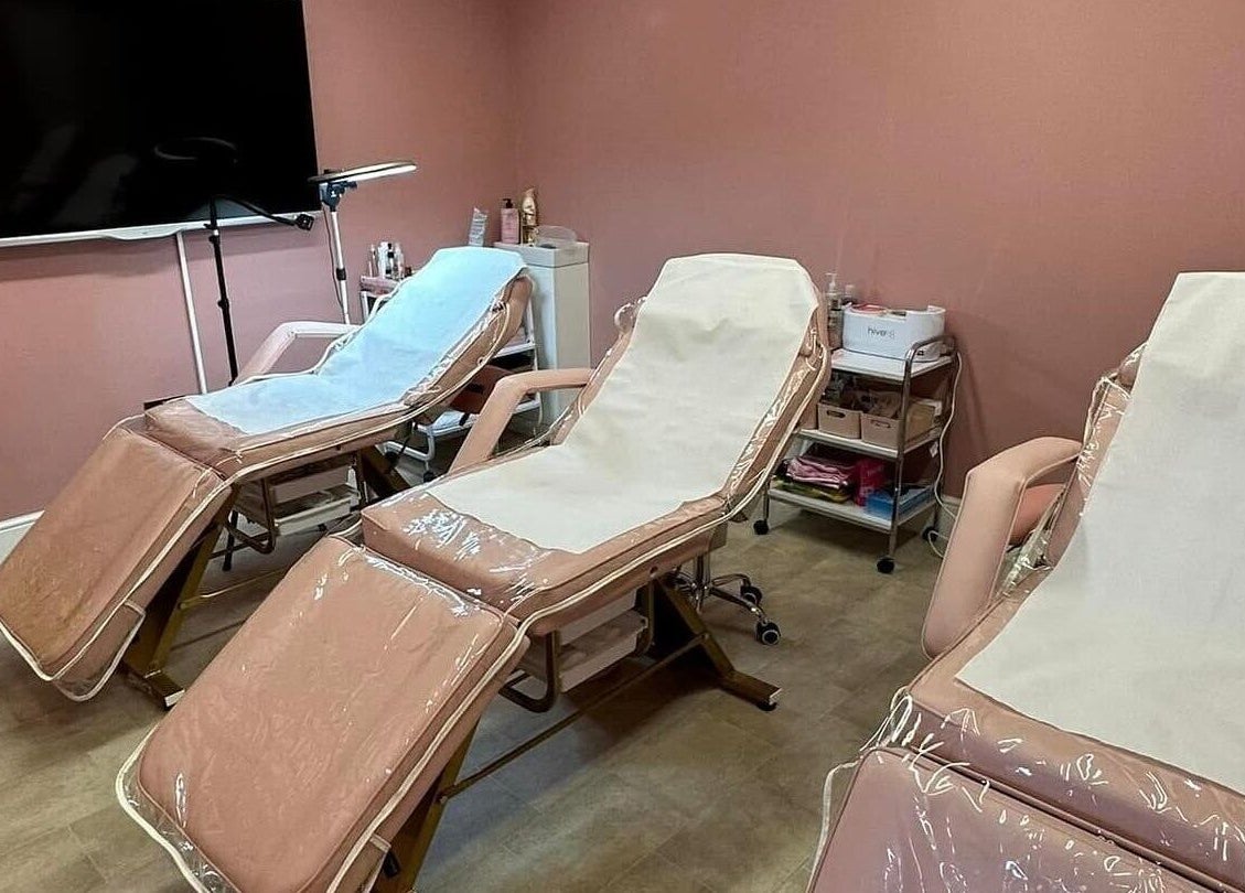 Relaxing treatment room at Artistry Clinic, Rotherham, England, GB featuring three comfortable chairs.