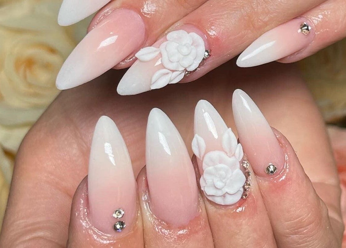 Exquisite nail art with floral designs at Artistry Clinic, Rotherham, England, GB.