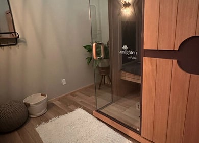 Relaxing sauna room at The Body Shoppe, Darlington, Wisconsin, US featuring modern wood design.