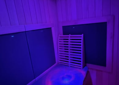 Relaxing sauna with ambient purple lighting at The Body Shoppe, Darlington, Wisconsin, US.