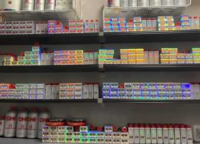 Diverse hair color products on shelves at 888 Salon, Chicago, Illinois, US.