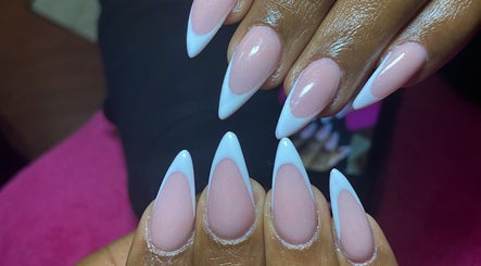Stylish French manicure with pointed tips at Nail and Art by Viola, Midrand, Gauteng, ZA.