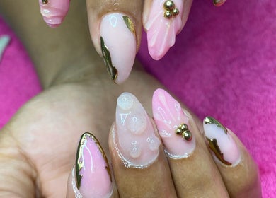Elegant pink and gold nail art at Nail and Art by Viola, Midrand, Gauteng, ZA.