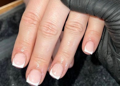 French manicure at Bartle Beauty, South Normanton, England, GB. Showcasing elegant nail care services.