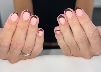 Stylish pink and brown nail art at Bartle Beauty, Somercotes, England, GB.