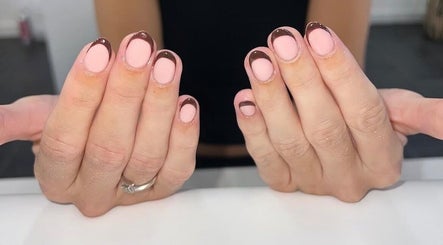 Stylish pink and brown nail art at Bartle Beauty, Somercotes, England, GB.