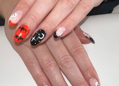 Festive Halloween nail art at Bartle Beauty in Somercotes, England, GB. Features bats, ghosts, and stars.