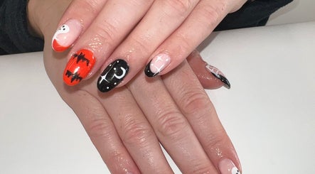Festive Halloween nail art at Bartle Beauty in Somercotes, England, GB. Features bats, ghosts, and stars.