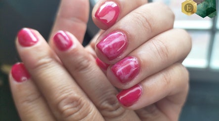 Bright pink manicured nails at Emma's Express Beauty Studio, Cape Town, Western Cape, ZA.
